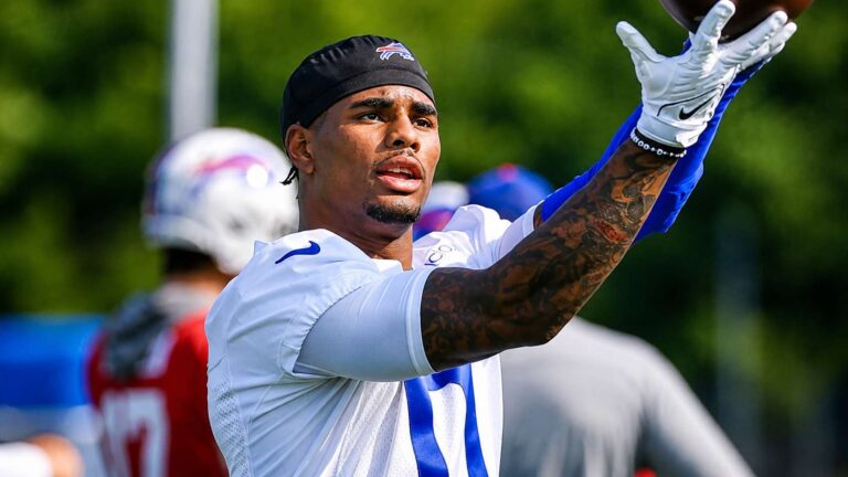 Buffalo Bills rookie wide receiver Keon Coleman catching a pass at training camp
